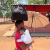 A parent in Dukwi Refugee Camp, Botswana